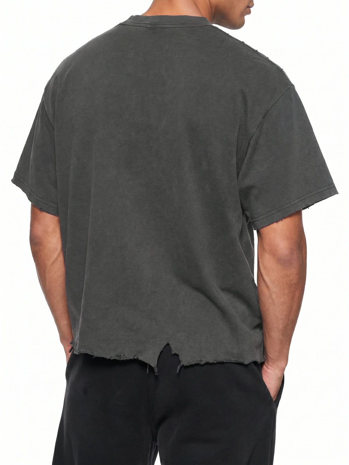 Unisex Vintage Washed Cotton T-Shirt, Boxy Loose Fit, Distressed Raw Hem, Drop Shoulder shown from the back on a model