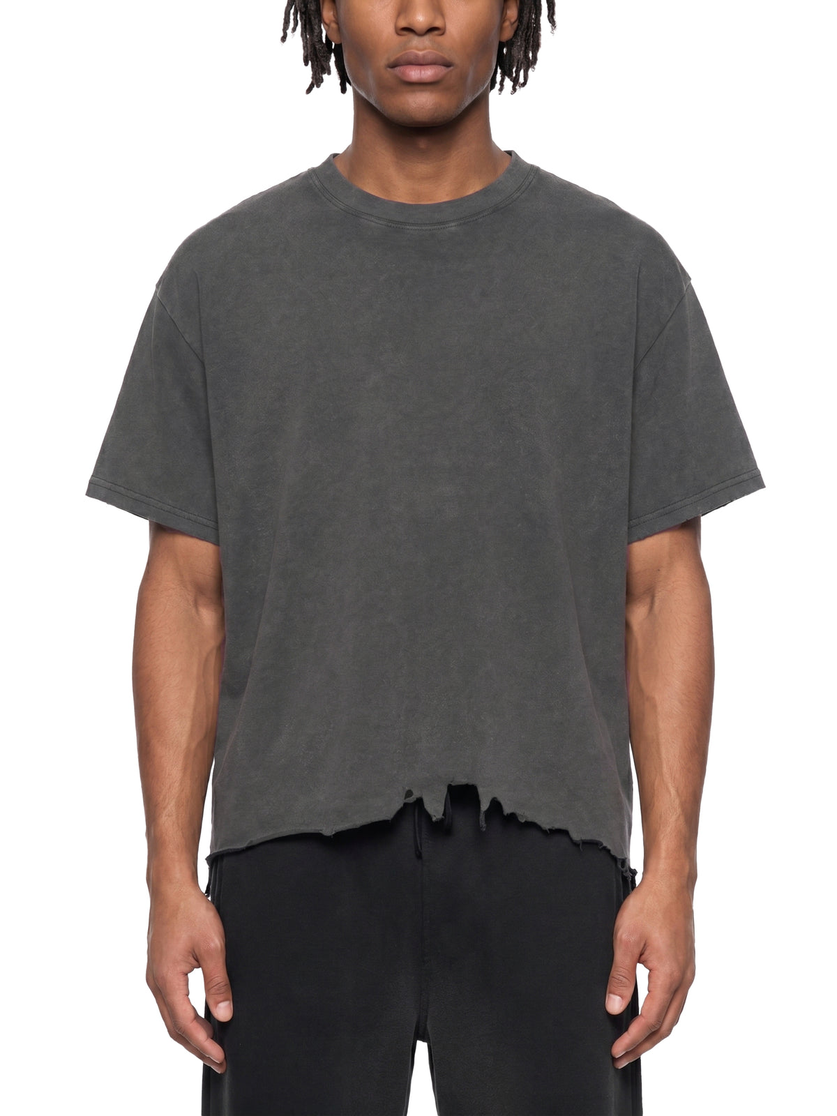 Unisex Vintage Washed Cotton T-Shirt, Boxy Loose Fit, Distressed Raw Hem, Drop Shoulder modeled from the front in charcoal gray