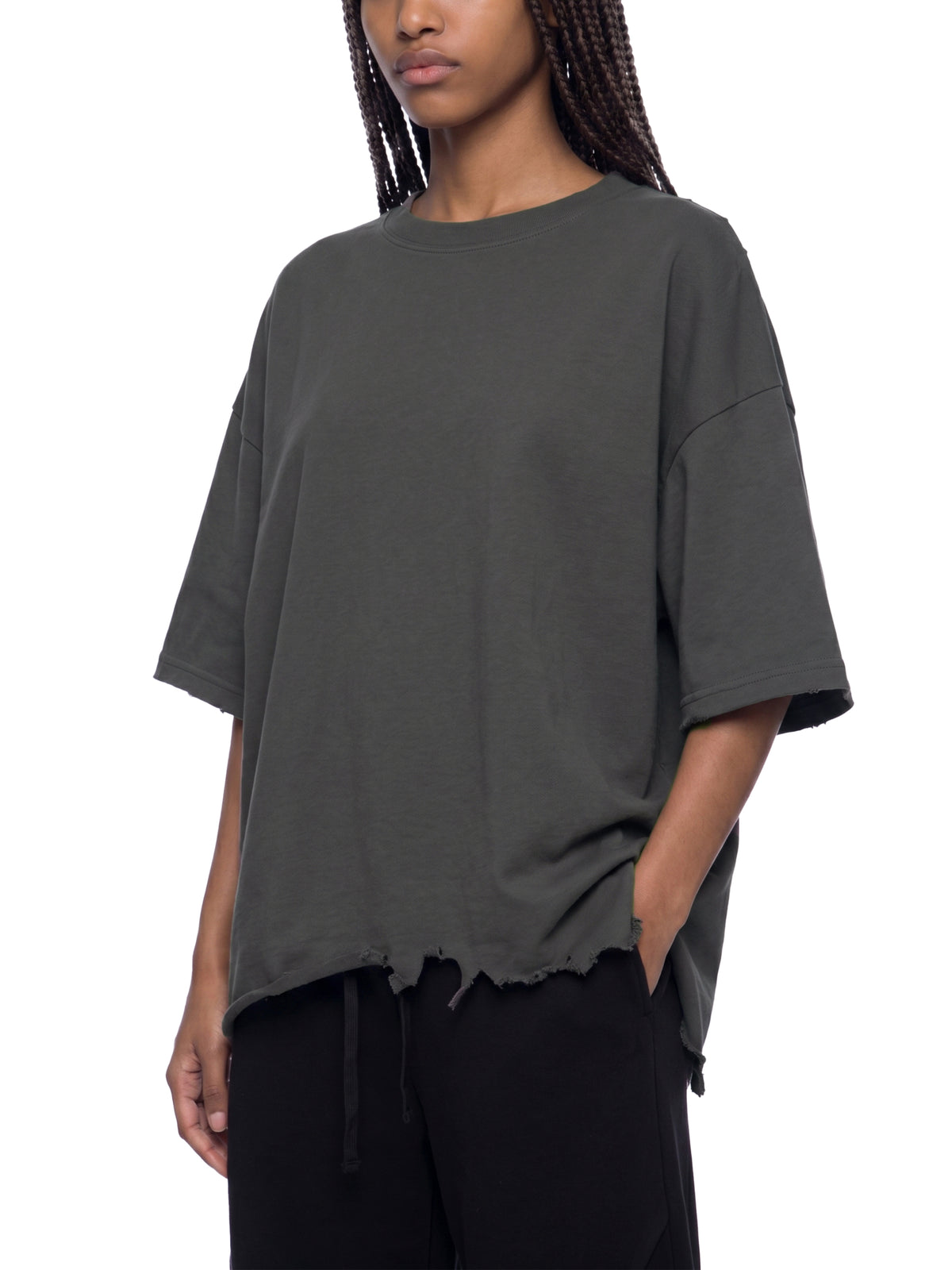 Unisex Vintage Washed Cotton T-Shirt, Boxy Loose Fit, Distressed Raw Hem, Drop Shoulder modeled from the front in dark gray with a relaxed oversized fit